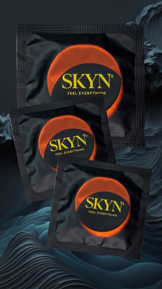 Безлатексные полиизопреновый презервативы SKYN Warming (согревающим эффектом) (по 1шт) - зображення 1